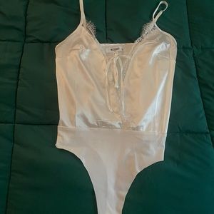 This is a body suit that is 100% polyester.